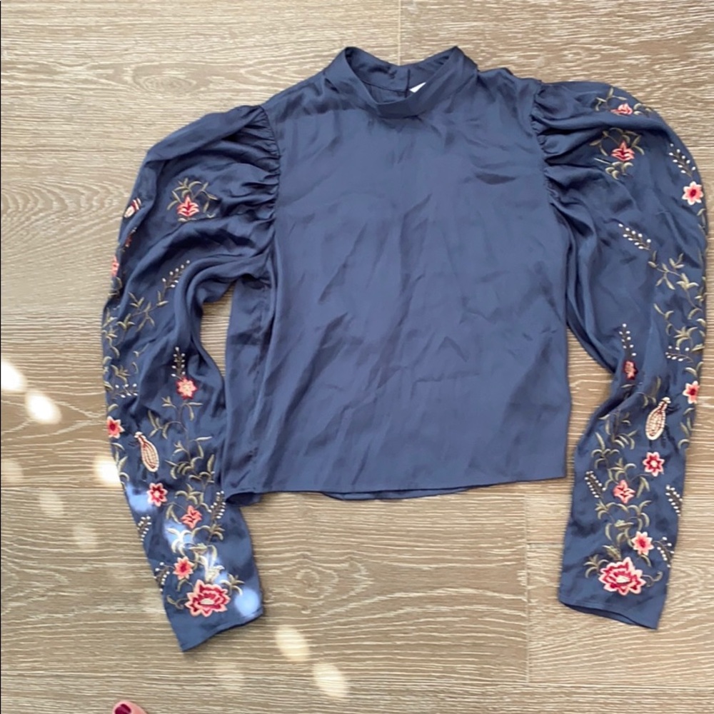 Exaggerated shoulder floral top